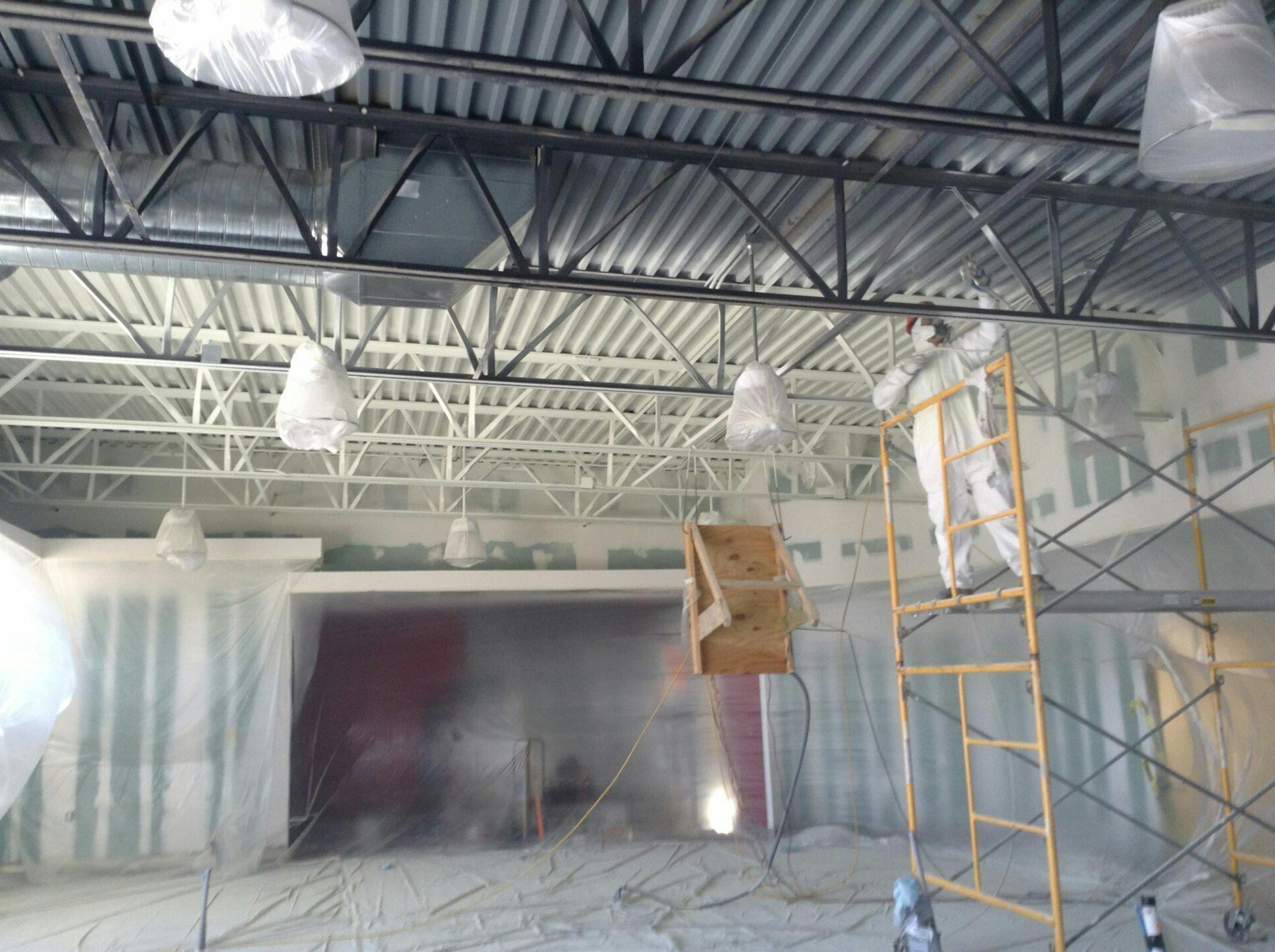 Industrial & commercial ceiling painting experts.